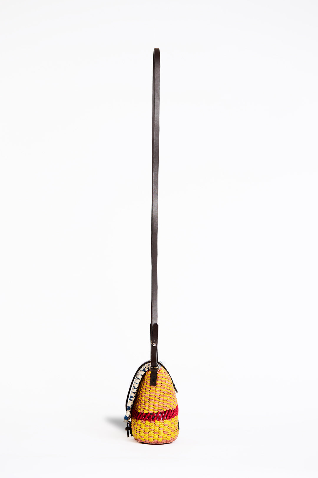 AAKS Bika Yellow handcrafted micro bag, long strap, profile view