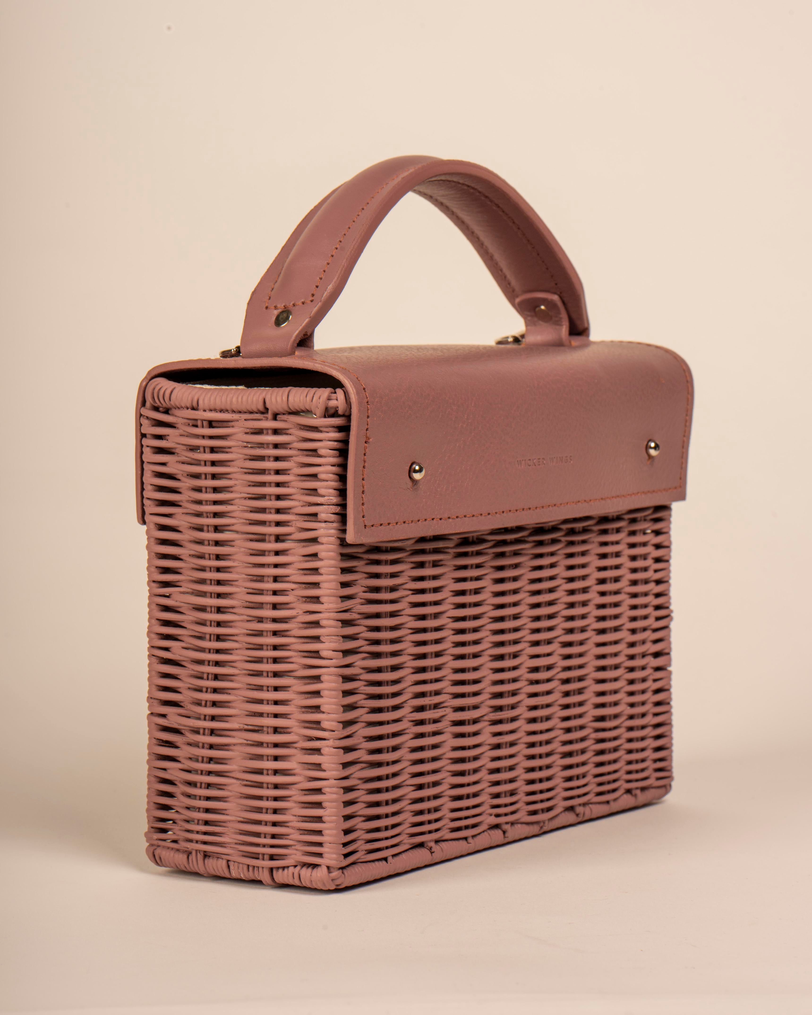 Wicker Wings handwoven Kuai dusk bag, side view.