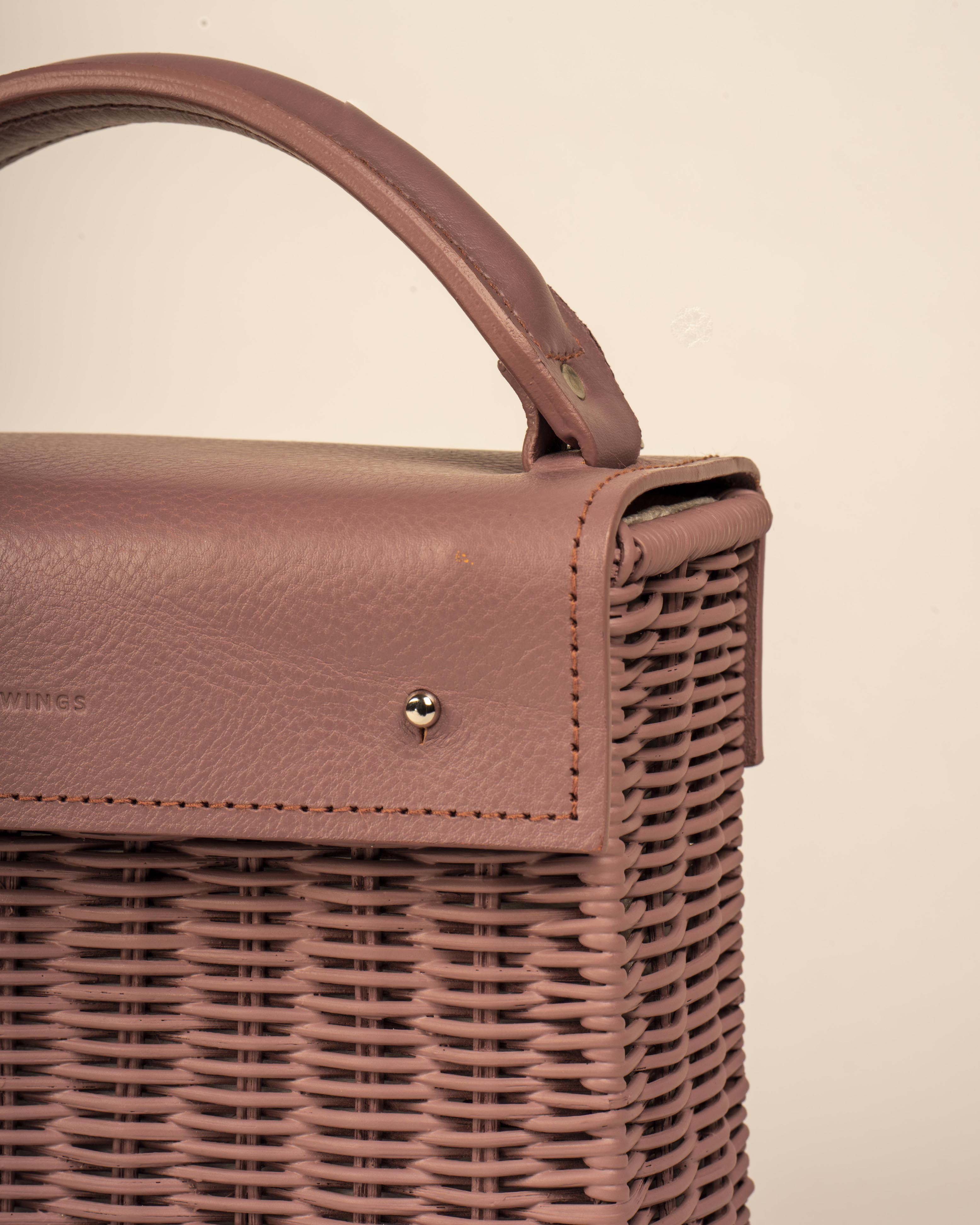 Wicker Wings handwoven Kuai dusk bag, close up of the front flap.