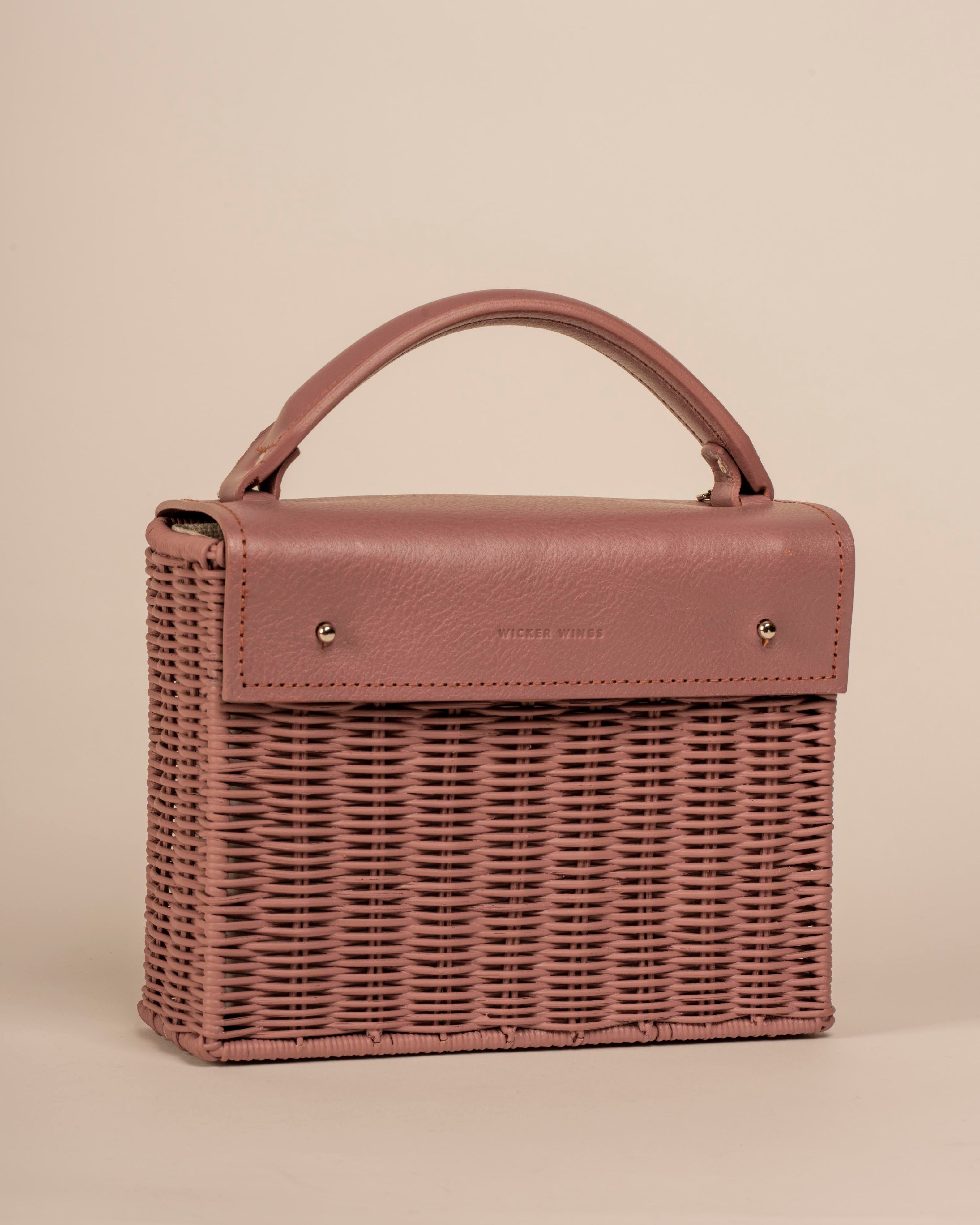 Wicker Wings handwoven Kuai dusk bag, shown at an angle.