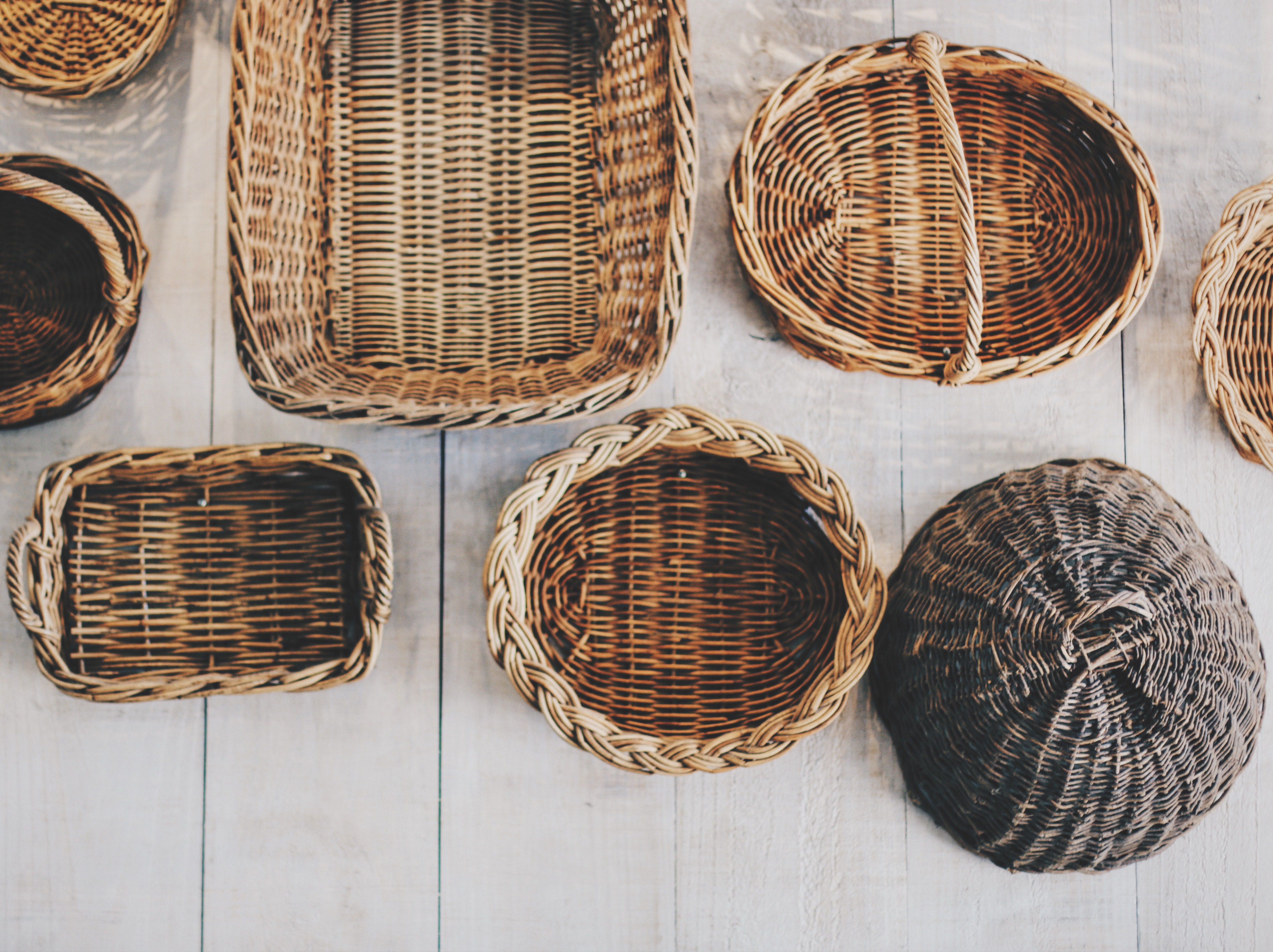 Assorted woven wicker baskets.