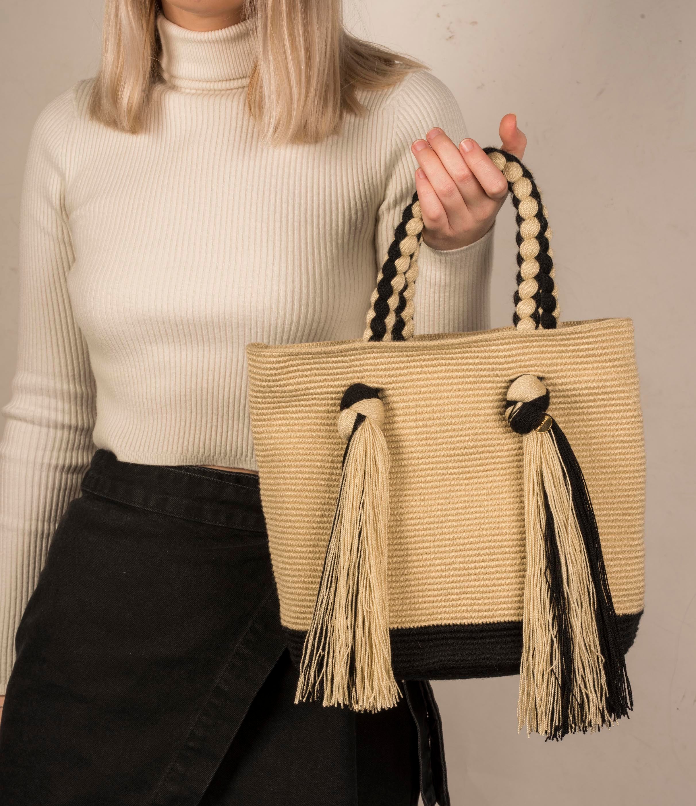 CHILA BAGS Juanma Tassel Tote Bag, held by model