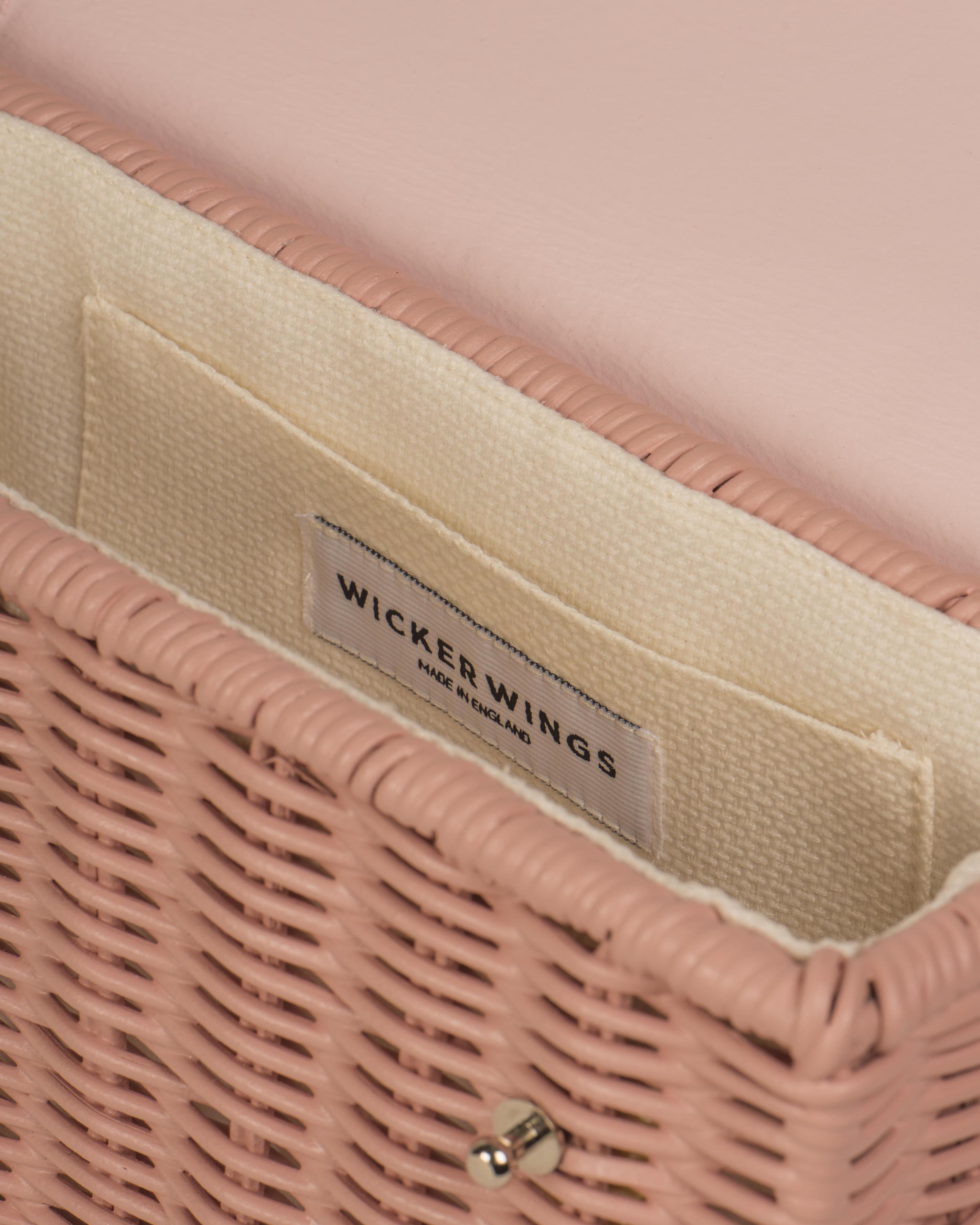 Wicker Wings Kuai handwoven wicker bag, pink, interior close up